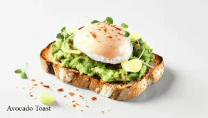 Avocado toast with poached egg and chili flakes on sourdough bread.